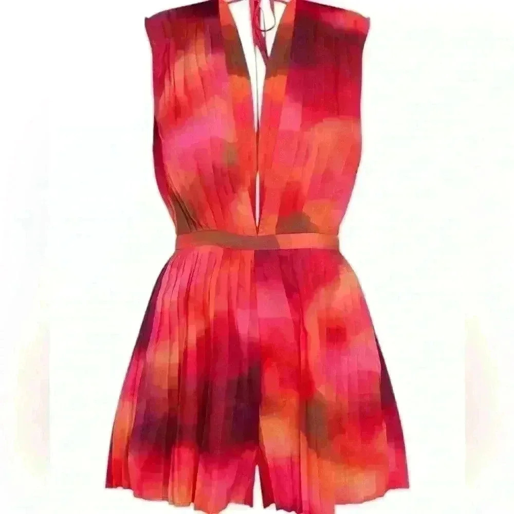PRETTY LITTLE THINGS- PINK WAVE PRINT PLEATED SHOULDER PAD PLUNGE ROMPER.